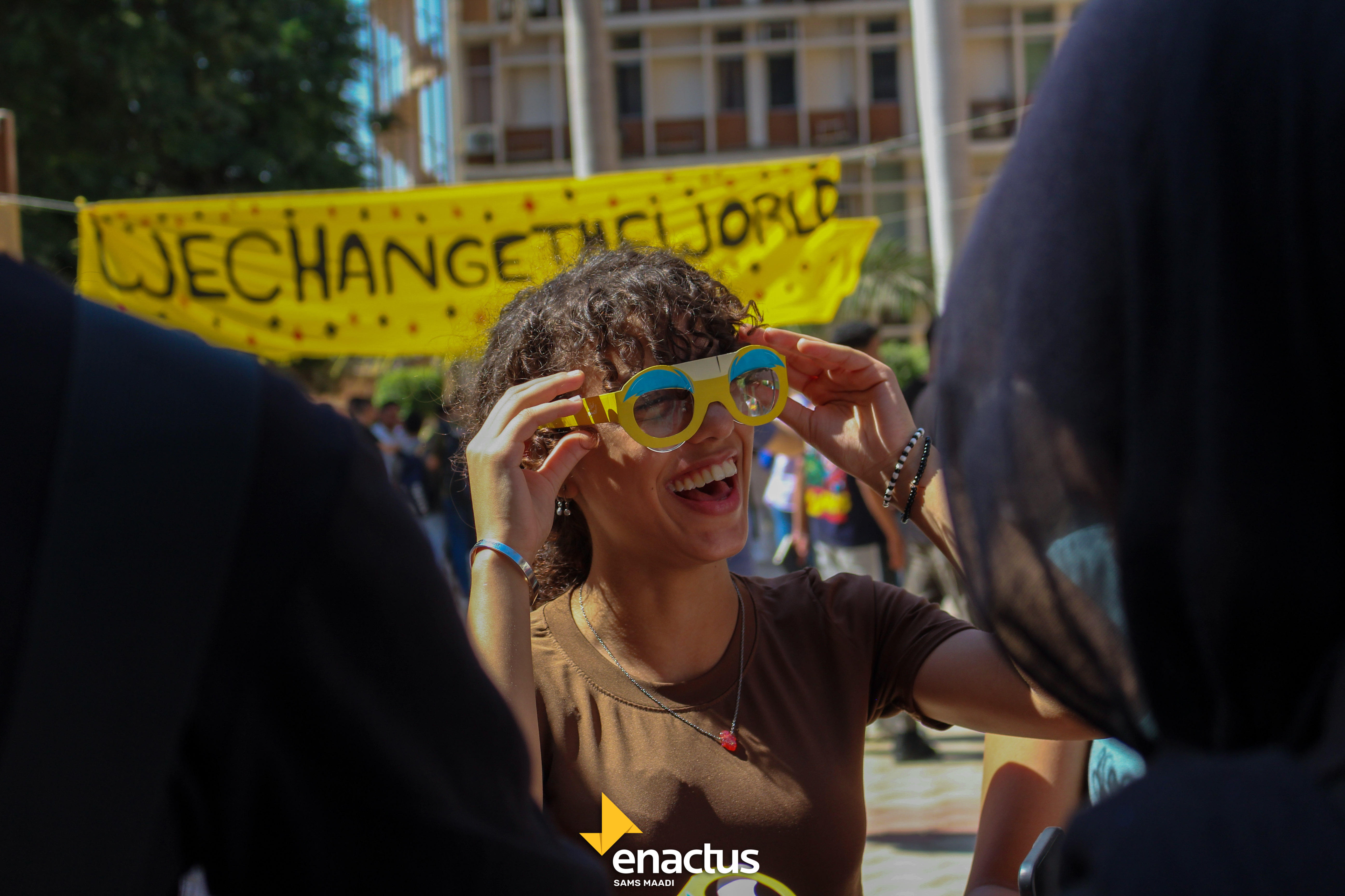 A student laughing during a campus activation